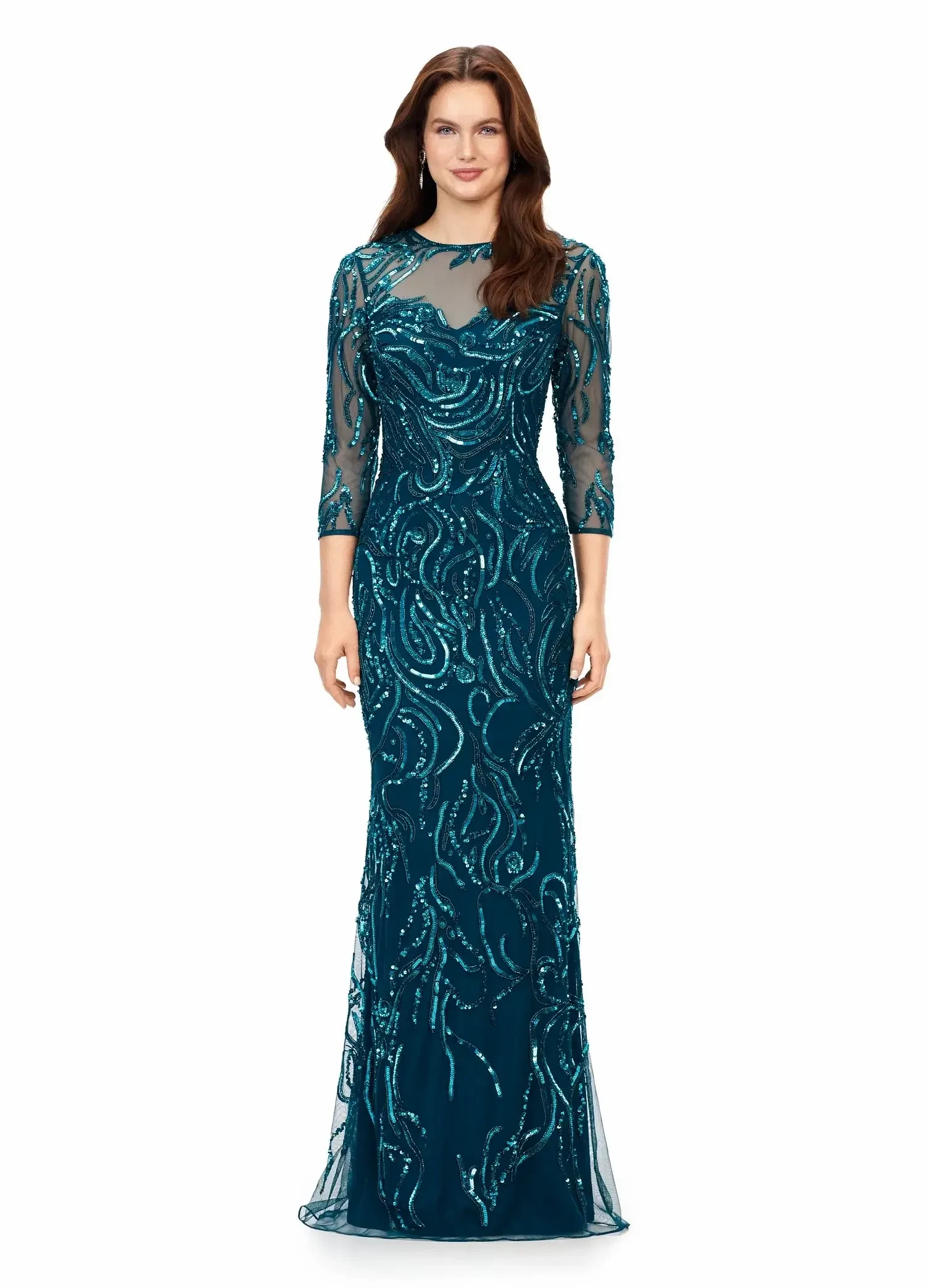 model is wearing a dark teal beaded floor length sheath gown