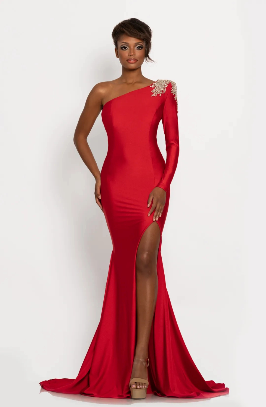 Model is wearing a one-shoulder dress with a thigh-high slit.